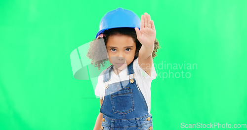 Image of Stop, construction and face of a child on a green screen isolated on a studio background. Safety, security and portrait of a girl kid with a warning hand for building, renovation and maintenance