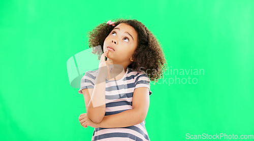 Image of Thinking, idea and green screen with young girl in a studio contemplating and relax planning. Question, youth thought and kid with ideas and creative vision feeling curious with contemplation