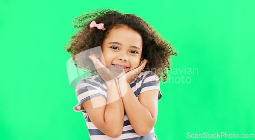 Image of Happy, little girl and green screen with smile of cute innocent child isolated against a studio background. Portrait of adorable female kid smiling with teeth for childhood youth on chromakey mockup