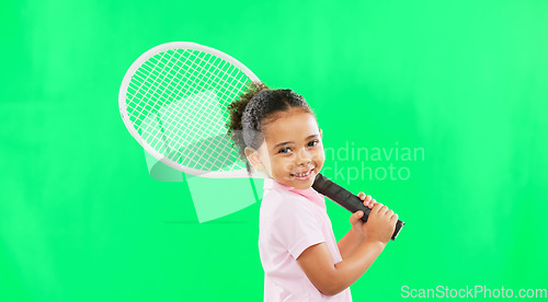 Image of Child, athlete and kid tennis player ready for training, exercise and workout isolated in studio green screen background. Portrait, girl and cute young person or beginner in fitness or sport
