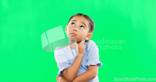 Image of Green screen, thinking and confused child in studio with decision, contemplation and pensive on mockup background. Doubt, emoji and unsure girl contemplating choice, why or solution while isolated