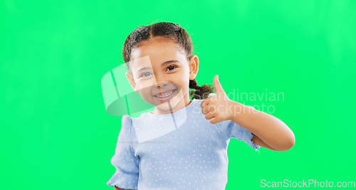 Image of Thumbs up, green screen and portrait of child in agreement excited, winning and girl kid isolated in studio background. Yes, approval and young person with yes or thank you hands, gesture or sign