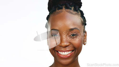 Image of Face, smile and laughter with a black woman in studio isolated on a white background for fun or humor. Portrait, happy and laughing with an attractive young female enjoying a joke or funny meme