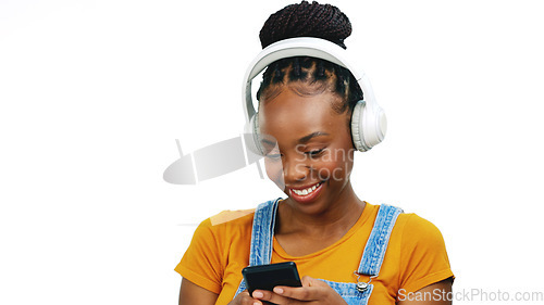 Image of Black woman listening to music with headphones, smartphone and dancing isolated on white background. Happy female, radio streaming with fun and enjoy playlist with audio subscription and mockup