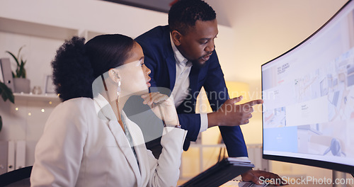 Image of Business people, night and team talking at computer for deadline, project report and corporate collaboration. Employees, discussion and planning at desktop with paperwork, overtime or online research