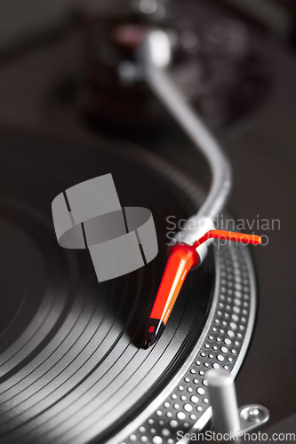 Image of Closeup, turntable and vinyl for music system, professional dj job and needle for sound, party and vintage audio gear. Zoom, retro record player and disc for scratch, spinning and club for listening