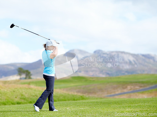 Image of Driver, girl or golfer playing golf for fitness, workout or exercise with a swing on a green course. Wellness, woman golfing or athlete training in action or sports game driving with a club stroke