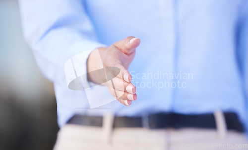 Image of Business woman, handshake and meeting for deal, hiring or introduction in partnership at office. Hand of female person or employer shaking hands for recruiting, welcome or b2b agreement at workplace