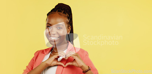 Image of Heart hands, happy and love with black woman in studio for icon, confident and kindness. Gratitude, smile and emoji with girl and positive gesture for support, care and sign isolated on background