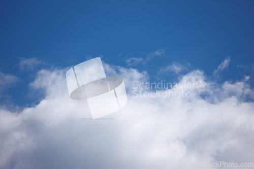 Image of Nature, space and atmosphere with clouds in blue sky for heaven, peace and climate. Sunshine, mockup and dream with fluffy cloudscape in ozone air for freedom, pattern and weather meteorology