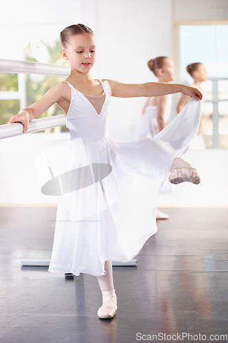 Image of Young girl, ballet training with dancer at academy, ballerina at practice and dancing at studio. Female child learning to dance in lesson, creativity with fitness and balance, focus and concentration