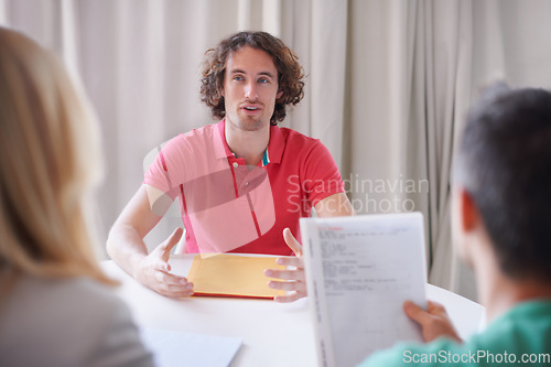 Image of Man, interview and meeting for a job, recruitment and hiring opportunity for a worker, employee and resume review. People, business and internship application, documents or conversation with hr