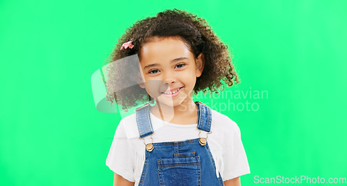 Image of Happy, little girl and green screen with smile of cute innocent child isolated against a studio background. Portrait of adorable female kid smiling with teeth for childhood youth on chromakey mockup