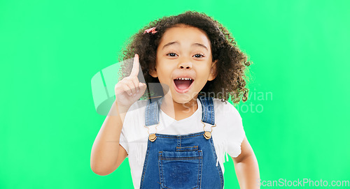 Image of Idea, thinking and child pointing up at mockup space or green screen isolated against a studio background. Portrait, cute and smart, clever and intelligent kid or young person for brand placement