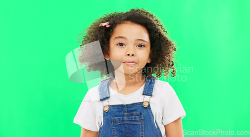 Image of Raise eyebrow, green screen and face of child on in studio for comic, meme and funny facial expression. Emoji mockup, childhood and portrait of young girl with happiness, humour reaction and excited