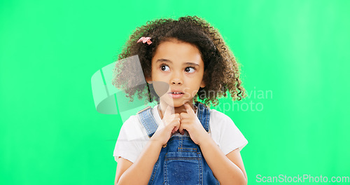 Image of Child, thinking and nervous girl on green screen background with hands on chin and confused face. Black kid in studio with space for mockup wondering about question, doubt and idea or think emoji