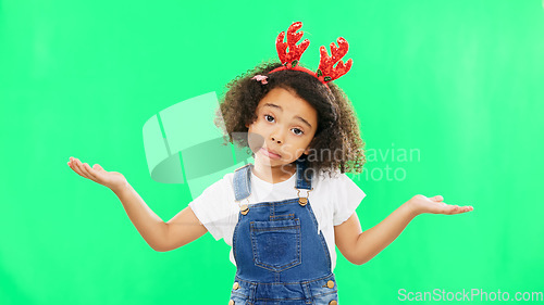 Image of Shrug, green screen and face of a child with a gesture isolated on a studio background. Confused, doubt and a portrait of a girl kid gesturing for choice, decision and indecision with mockup