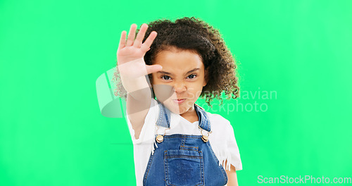 Image of Angry child, stop and hand on green screen background with emoji and attitude. Black kid portrait in studio with space, mockup and sign for warning, power and protest to reject, defence or decline