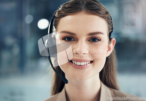 Image of Consultant, portrait of woman call center agent with headset and in her modern workplace office. Networking or online communication, telemarketing or customer service and support with female person