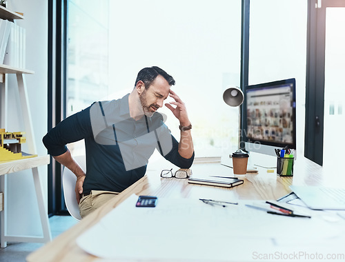 Image of Businessman with back pain, injury and headache from stress in the office while working on project. Medical emergency, healthcare and mature male employee with migraine and sprain muscle in workplace