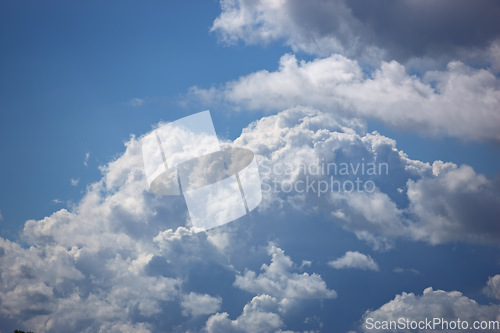 Image of Nature, space and heaven with clouds in blue sky for environment, peace and climate. Sunshine, mockup and dream with fluffy cloudscape in ozone air for freedom, pattern and weather meteorology