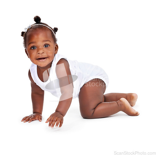 Image of Smile, portrait and African girl baby isolated on white background with playful happiness, crawling and growth. Learning to crawl, play and development, happy face of black child on studio backdrop.