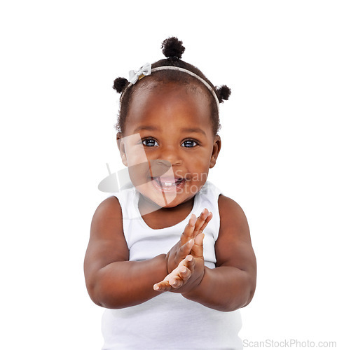 Image of Portrait, infant and baby with a smile, applause and happiness isolated against a white studio background. Face, female person and toddler clapping, cheerful and newborn excited and hands together