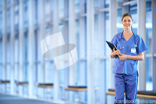 Image of Healthcare, portrait of woman doctor and clipboard standing in a hospital smiling for protection. Nursing, health wellness female nurse or surgeon smile for happiness with a patients chart at clinic