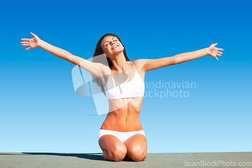 Image of Freedom, body and woman in underwear stretching arms on mockup space and blue sky, celebrate life feeling happy and relax. Smile, positivity and female embracing nature, free and confident outdoor