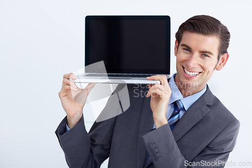 Image of Laptop, mockup and happy business man portrait holding screen space on studio white background. Smile, display and face of male person with computer copy space for advertising, marketing or branding