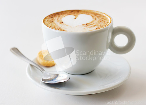 Image of Coffee cup, latte and art in restaurant creativity, customer service and hospitality or food industry background. Cafe shop, closeup, espresso drink and inspiration, creative heart design and cream