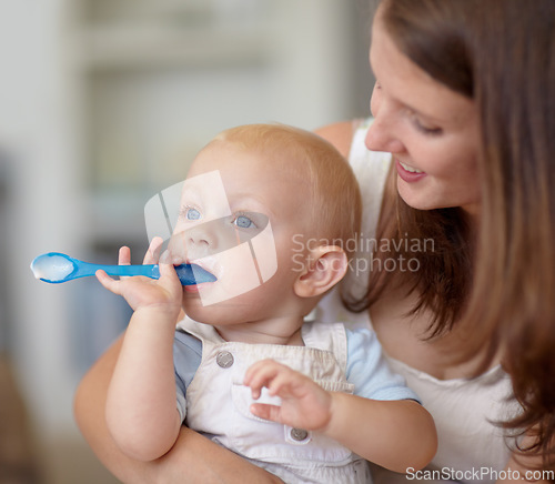 Image of Mom, baby and feeding food, breakfast and eating for healthy nutrition in home. Happy mother, newborn and feed hungry child, infant or toddler meal with a spoon for growth, development and wellness.