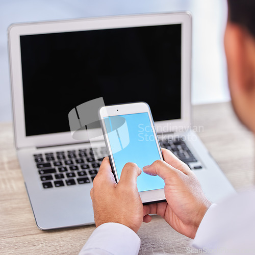 Image of Businessman, hands and phone with mockup screen for social media, communication or networking at the office. Hand of man employee typing or texting on mobile smartphone mock up display at workplace