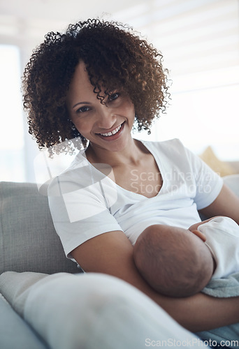 Image of Happy, portrait and mom breastfeeding her baby for health, nutrition and wellness at home. Bonding, love and young mother nursing or feeding her newborn child milk on the sofa in their family house.