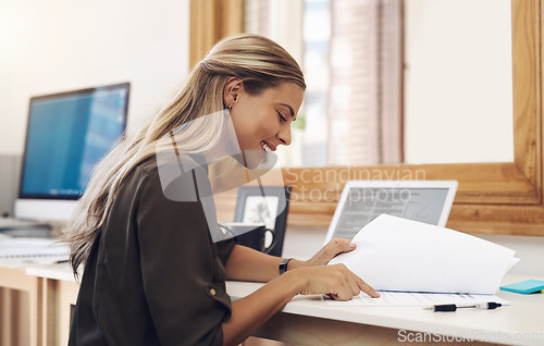 Image of Paperwork, business woman and accountant reading report for information, financial data or analysis. Documents, auditor and happy female professional check contract, review and bookkeeping in office.