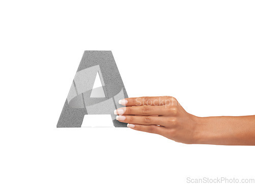 Image of Alphabet, uppercase and a hand with capital letter A for learning, advertising or font. A woman show sign, character or icon for communication, typo and grammar isolated on a studio white background