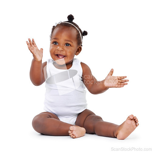 Image of Baby, girl and smile with infant, excited and cheerful isolated against a white studio background. Female child, kid on the floor and adorable toddler with joy, relax and growth with newborn and care