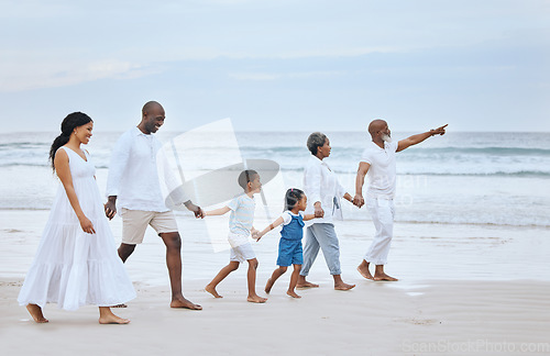 Image of Family walk on beach sand, holding hands and generations, tropical vacation in Mexico, travel and trust outdoor. Grandparents, parents and kids, happy people with adventure and tourism with sea view