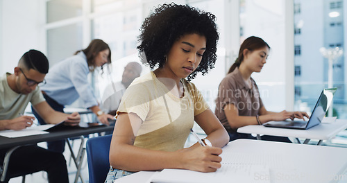 Image of Education, exam and girl university student in classroom for business management lecture or studying. Phd, writing and focused female college learner in a lecture for future, career or development