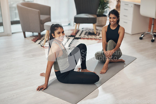 Image of Friends, yoga exercise and portrait of women together in a house with a smile, health and wellness. Indian sisters or female family in a lounge while happy about workout and fitness with a partner