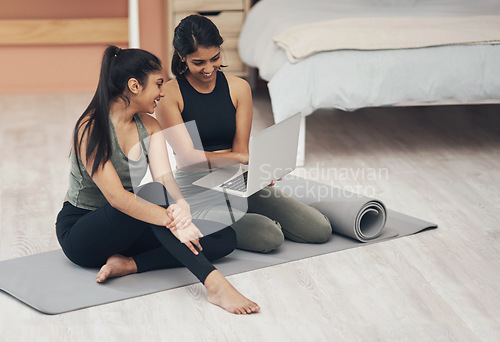 Image of Women, laptop and exercise together at home with happiness, health and wellness. Indian sisters or female friends in a lounge for online class, yoga website or fitness workout video with a partner