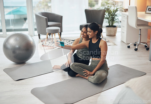 Image of Exercise, fitness selfie and women together at home for social media memory or post. Indian sisters or female friends in lounge with a photo for influencer update, workout motivation or happy results