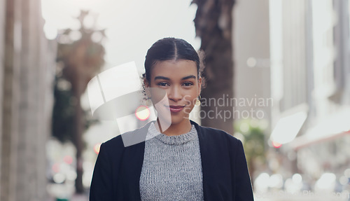 Image of Corporate, portrait and business woman in city for morning, professional or focus. Confident, smile and natural with face of female employee in urban outdoors for entrepreneurship, happy or pride