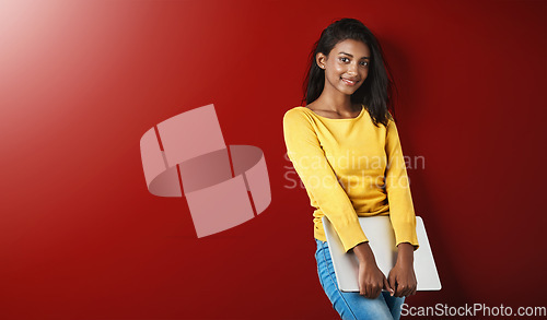 Image of Happy woman, student and studio portrait with a laptop for university and school work with mockup. Isolated, gray background and education of Indian female person with smile and computer for college