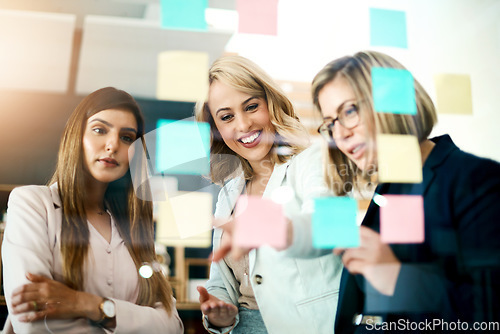 Image of Women, teamwork and brainstorming schedule of ideas, business goals and mindmap of solution. Diversity, employees and planning with sticky note for timeline, workflow process and analysis of target