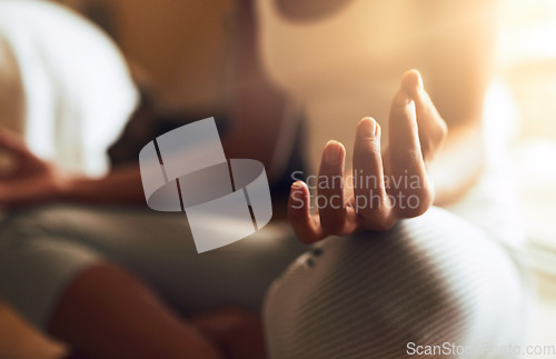 Image of Woman, hands and relax in meditation for zen, health or spiritual wellness at home. Closeup of female yogi hand meditating for relaxation, mind and awareness for healthy mental wellbeing in the house