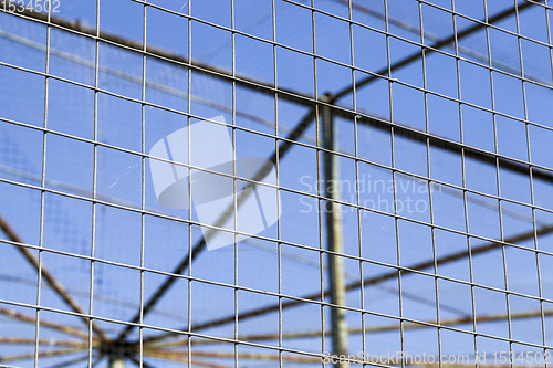 Image of an old metal cage