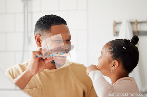 Image of Father, child and brushing teeth in a family home bathroom for dental health and wellness in a mirror. Happy african man and girl kid learning to clean mouth with a toothbrush for oral hygiene