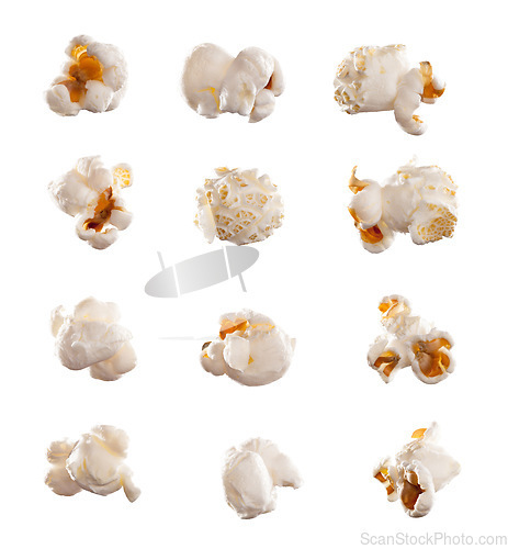 Image of Food, popcorn kernels isolated and against a white background for snack. Cooking fresh corn or salt nutrition, unhealthy diet or grain and junkfood for movie at cinema against a studio backdrop