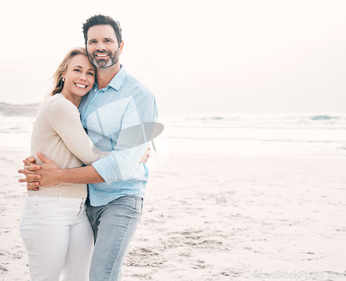 Image of Beach, love and portrait of couple hug with smile on holiday, vacation and weekend for marriage. Travel, mockup space and happy mature man hugging woman for bonding, quality time and relax by ocean